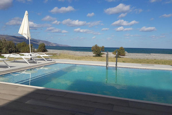Beach Front Villas are two modern 4 bedroom villas next to the beautiful sandy a Agios Nikolaos, Greece Tavronitis Beach Front Villa 2 Entire villa vacation rental 23756977