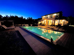 The villa is set in a lovely private setting....lush green shrubs and trees shei Stanway, United Kingdom Villa Helena Kalamitsi with stunning views Entire home vacation rental 42887541
