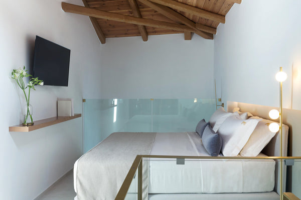 The two-level Amethyst suite has a comfortable living room with a sofa bed on th Chania, Greece Amethyst Suite - Mirabile Luxury Suites Room in boutique hotel vacation rental 44725717