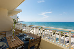 Enjoy your wine with the view of the Venetian Castle of Rethymno and the blue of Rethimnon, Greece Seafront Deluxe Apartment Entire rental unit vacation rental 21628301
