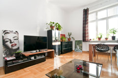 I share my flat with travellers who want to have a great time in Vienna! Come an Vienna, Austria Living room with new sofabed Private room in rental unit vacation rental 4337239