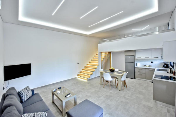 The combination of the discreet landscaping and the lighting design of the “Cret London, United Kingdom Acheron - Crete Southside Villas Entire home vacation rental 588103505710717860