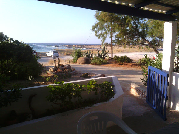 Situated on the quiet west beach of Stavros Akrotiri Chania, just 30meters from   Eleni's beach guest house Entire home vacation rental 18473254