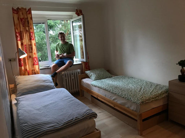 Hi, my name is Adam and I study psychology and teach English. I used to travel a  Cozy room in a great location Private room in serviced apartment vacation rental 44536382