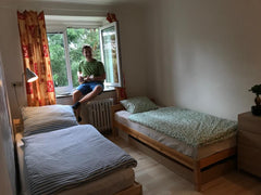 Hi, my name is Adam and I study psychology and teach English. I used to travel a  Cozy room in a great location Private room in serviced apartment vacation rental 44536382