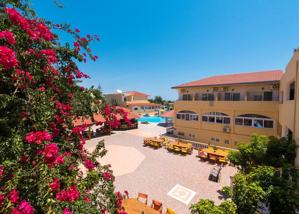 The hotel is located in the tourist resort Kolymbia,<br />In a quit area about 1  All Inclusive Triple Room overlooking the garden Room in hotel vacation rental 30725695
