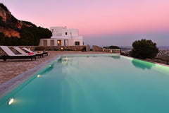 Prepare for the holiday of a lifetime in this exquisite 3 villa complex, carved  Athens, Greece Panoramic three villa complex with helipad Cycladic home vacation rental 24575303