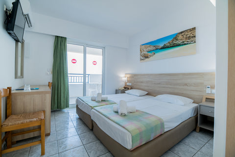 All the rooms are decorated in earthy shades and they have a balcony overlooking  Standard Room Room in hotel vacation rental 49379083