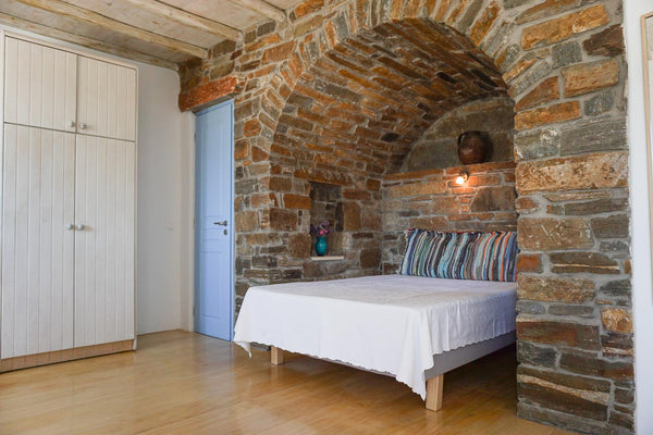 Α spacious studio of traditional cycladic architecture with stone walls. It has  Athens, Greece Mamas Studio Mykonos II Cycladic home vacation rental 25940520