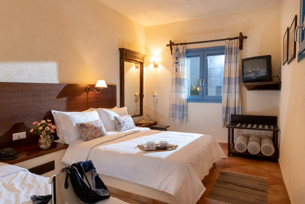 Situated directly on the sea, on a rocky seashore, in the small fishing village  Sisi, Greece Porto Sisi Sea Front Suite Room in serviced apartment vacation rental 34378652