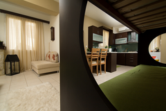 It is consisted of a one bedroom space, a bathroom, a well equipped kitchen corn  Home Suites - Superior One Bedroom Apartment Room in hotel vacation rental 15367949