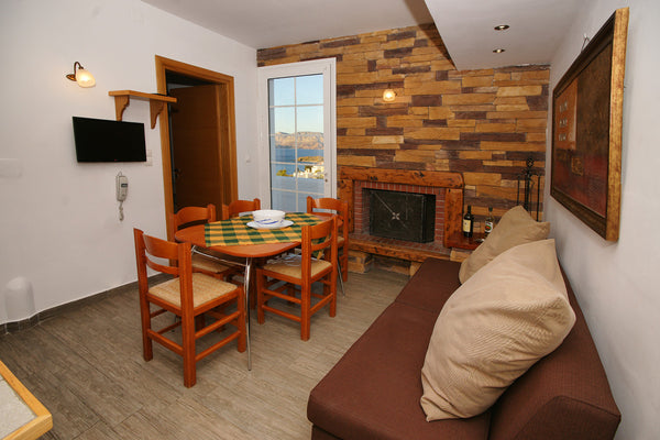 It's a equipped house with an amazing view and a fireplace. It can be used both   Vasilis Studios - Family House with Panoramic View Entire home vacation rental 45010200