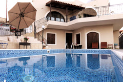 Elia Woodstone Houses were renovated to highlight the architectural and traditio Elea, Greece Irida Woodstone House 4 bedrooms Shared Pool Entire home vacation rental 12228218