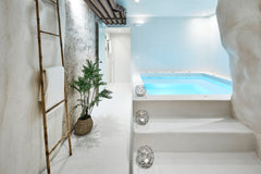 Carved into the volcanic rocks, the maisonette-styled King Suite retains its tra  Winery Hotel 1870-King Suite with Indoor Plunge Pool Room in hotel vacation rental 44328364