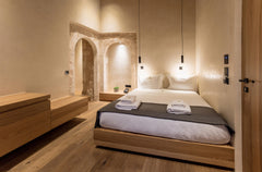 In perfect harmony with the historical elements of the room, the Signature Suite  Signature Suite with private patio & hot tub Room in hotel vacation rental 53072847