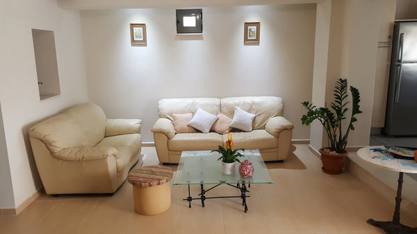 The house is in an elevated apartment with an area of 130 sq.m. And outside cour  Villa in Stalos Entire home vacation rental 19512667