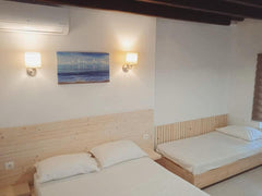 Το Occasus Room Comfort βρίσκεται στη Χάλκη, λιγότερο από 1χλμ. μακριά από την π Chalki, Greece Occasus Comfort Room Private room in vacation home vacation rental 16775133