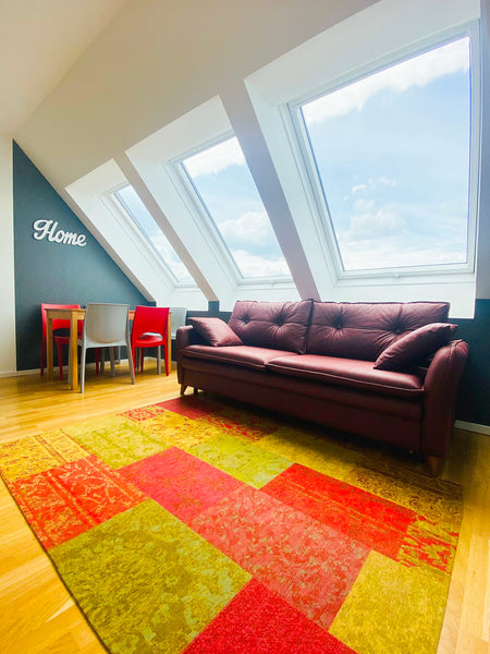 Have a glass of wine while enjoying Netflix on the comfortable sofa after explor Panama City, FL Delightful Duplex Danube Canal Entire rental unit vacation rental 43935888