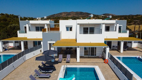 A 3-villa complex, with 7 bedrooms, 3 kitchens and 3 private pools. Each villa i Greece South Beach Villas - Sea view with 3 pools Entire villa vacation rental 49416758