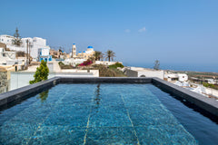 A traditional cave house just renovated to a brand new premium property offering  Mirinda premium villa Cycladic home vacation rental 25294561