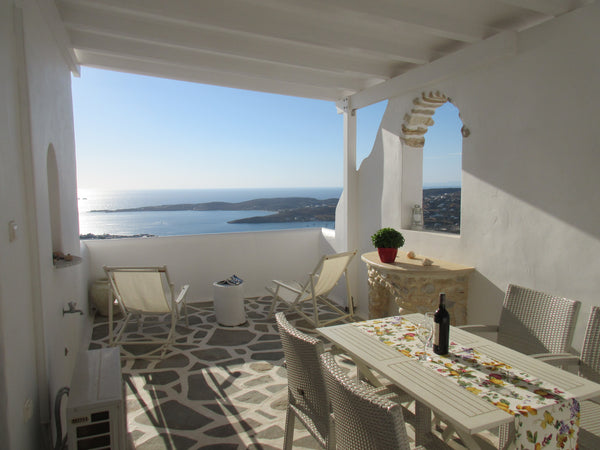 On the hill overlooking Parikia and offering priceless views and Sunset this apt Paros, Greece sunset aegean panorama1 Cycladic home vacation rental 5441919
