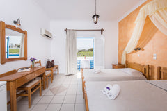 Our room is located in a quiet neighborhood, yet only a few minutes walk from Fi Greece Private double room with a view in Karterados Room in bed and breakfast vacation rental 25095328