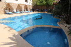 4 villas with  one big private pool.<br /><br /><b>The space</b><br />Location h Prinos, Greece Perfekt für Group 24 Personen mit Beheizter Pool! Entire villa vacation rental 16850639