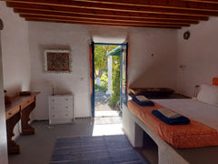 Rosmarino room with private bathroom and kitchenette is part of an ecovilla faci Rome, Italy Arancio independent room in Ecovilla on the beach Private room in home vacation rental 28456906