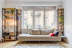 Lounge in front of the spacious latched windows with a midnight snack from the n Brussels, Belgium Sunny, Modern 1-Bed Apartment near Prestigious Louise Avenue Entire rental unit vacation rental 20647319