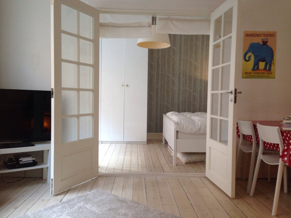 Charming ground floor apartment at the quiet end of vibrant street full of great Copenhagen, Denmark Cosy family friendly close to city Entire rental unit vacation rental 15599696