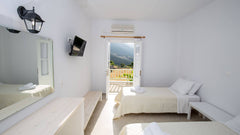 Twin room in a newly renovated, family-run hotel in the heart of Katavati.<br /> Greece Twin room in Hotel Galini in Katavati Room in aparthotel vacation rental 26131645