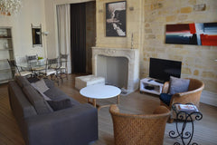 Molded ceilings, fireplace and stone wall for the stay of this beautiful traditi Bordeaux, France Apartment-City-Ensuite with Shower-City View Entire rental unit vacation rental 5470880
