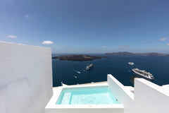 This breathtaking villa is 60 Sq.m, built inside an original cave has an earthy  Thera, Greece Villa Drop, heated plunge pool, caldera view Cycladic home vacation rental 37134450