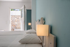 The Economy room do not offer any view or window, there are on the ground or bas Kamari, Greece Economy Double Room with Breakfast Private room in bed and breakfast vacation rental 41785455
