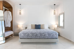 Guests opting for the Delight Suite with outdoor jacuzzi & sea view are in for a Greece Delight Suite | Outdoor Hot Tub Sea & Sunset View Room in boutique hotel vacation rental 24509251