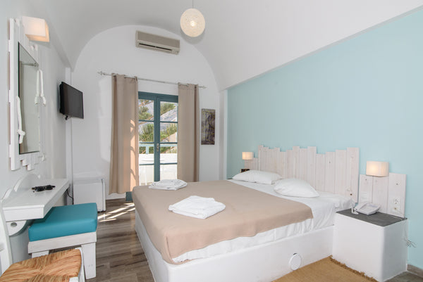 The Double room with balcony or terrace is newly renovated & offers all modern f Kamari, Greece Double Room with balcony&breakfast Room in bed and breakfast vacation rental 16007244