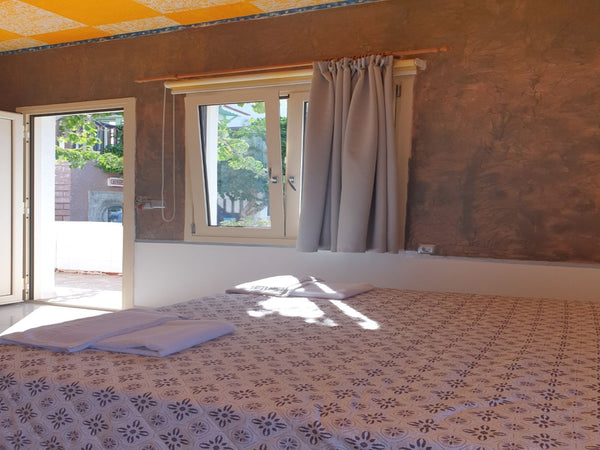 On the hillside of the traditional Piskopiano village , surrounded by Mediterran  Studio Quiet And Peaceful And Very Relaxing with kitchen, shared pool and Ac Private room in rental unit vacation rental 44022839