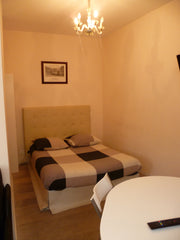 It is a quiet, bright studio, in a small stone building, in the heart of the qui Bordeaux, France Studio Bordeaux Chartrons / Jardin Public Entire rental unit vacation rental 21877456