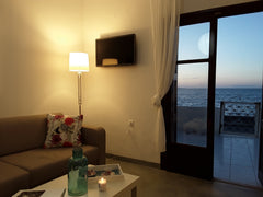 Waves House is a 50 sqm. house on the seaside located on Drapanias beach,just a  Glyfada, Greece Waves House Entire rental unit vacation rental 34539070