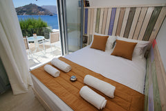 a newly renovated apartment,  on the seashore of Telendos island, with magnifice  POTHEA Apartment - AFRODITE LUXURY ROOMS TELENDOS Entire rental unit vacation rental 36740262