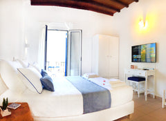The cycladic studio is equipped with air conditioning system, kitchen with utens Kini, Greece Loukia's Executive Studio Entire rental unit vacation rental 26174902