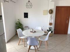 Curl up with a book on the light bedroom, enjoy a dinner among family in the spa Palaio Faliro, Greece NEW...Bright and Modern Apartment NEXT to the BEACH Entire rental unit vacation rental 25319012