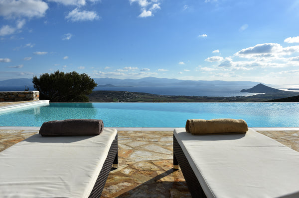 Villa Oliviers is a home right out of the pages of Elle Deco, according to one o Athens, Greece Deluxe Villa - Infinity Pool & Helipad Cycladic home vacation rental 13013077