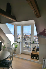 A spacious 97sqm penthouse apartment with views of the sea (700 meters away) and Copenhagen, Denmark Sunny penthouse, w/balcony between city and beach Entire loft vacation rental 571631458187192974