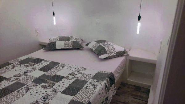 The house is in a quiet neighborhood in Plakes and has a yard with view. It cons  Kirarini's House Cycladic home vacation rental 27431459