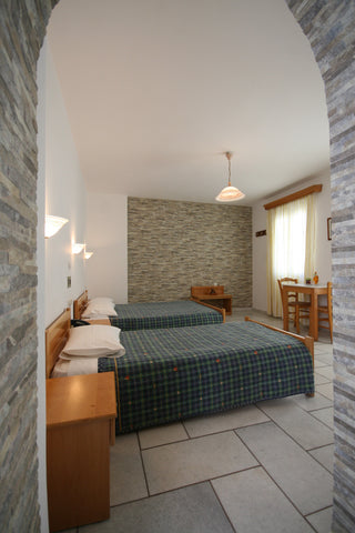 Aegeon Apartments is a family business. Fully equipped, spotless apartments crea  Studio (4 persons ) with Balcony Private room in bed and breakfast vacation rental 12716618