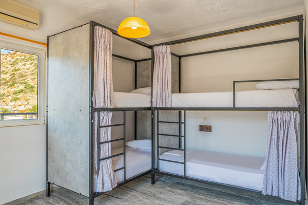 A private six bed room with en-suite bathroom in Matala Hostel, Europe's souther  Six Bed Room with bathroom in Matala Hostel Private room in hostel vacation rental 514270238936836790