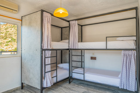 A private six bed room with en-suite bathroom in Matala Hostel, Europe's souther  Six Bed Room with bathroom in Matala Hostel Private room in hostel vacation rental 514270238936836790