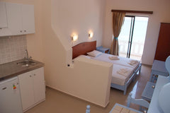 A comfortable studio, part of "Mandy suites" hotel unit, located just at Kissamo Kissamos, Greece Pool view studio - Mandy suites at the seafront Room in bed and breakfast vacation rental 27840478