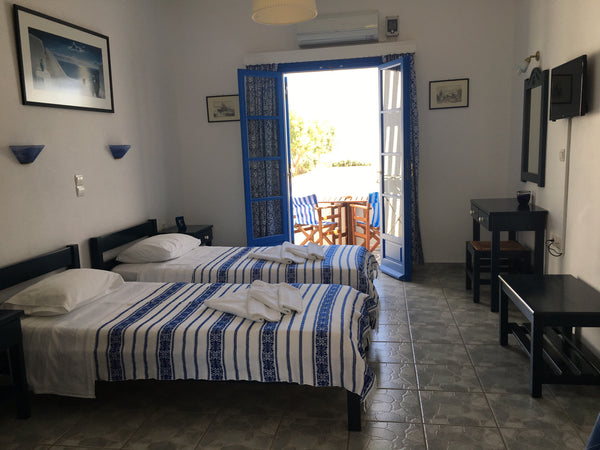 The Studio is located at the sandy beach of Agii Anargyri at Naoussa,Paros. <br  Naousa, Greece Blue Apartment with Sea View II Private room in cycladic house vacation rental 26588357